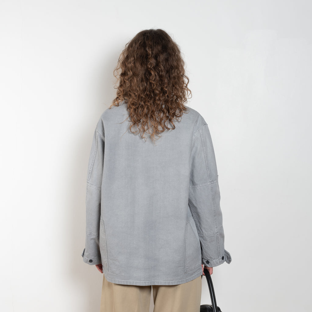 The Barn Jacket by 6397 is a cotton canvas jacket with workwear details and a contrasted waxed canvas collar