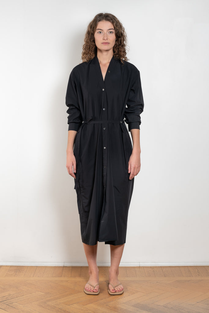 The Collarless Shirtdress by 6397 is a superfine cotton dress with a soft sheerness and full button closure