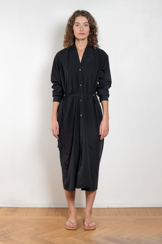 The Collarless Shirtdress by 6397 is a superfine cotton dress with a soft sheerness and full button closure