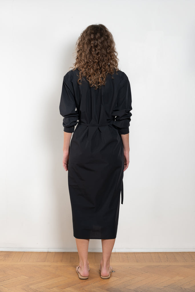 The Collarless Shirtdress by 6397 is a superfine cotton dress with a soft sheerness and full button closure