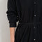 The Collarless Shirtdress by 6397 is a superfine cotton dress with a soft sheerness and full button closure