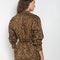 The Collarless Shirtdress by 6397 is a superfine cotton dress with a soft sheerness and full button closure