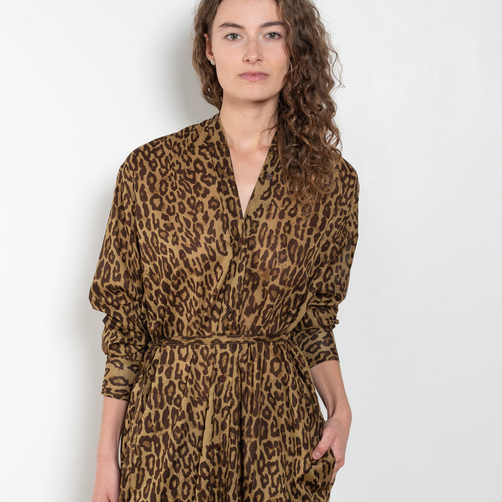The Collarless Shirtdress by 6397 is a superfine cotton dress with a soft sheerness and full button closure