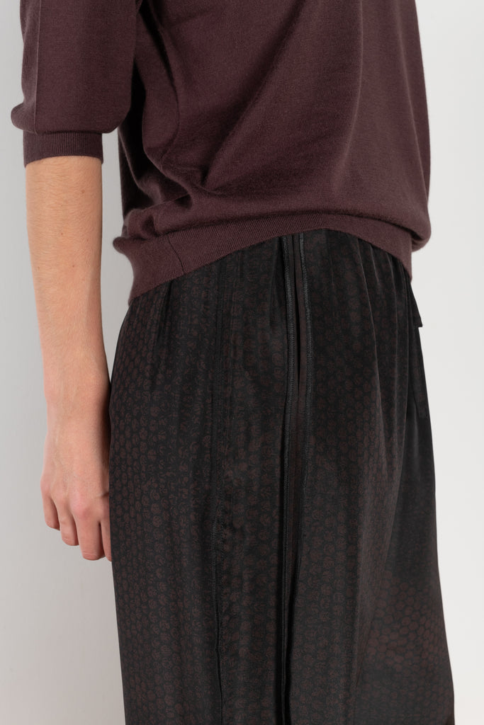 The Inside Out Drawstring Pant by 6397 in silk habotai has a subtle monochromatic print with 'inside out' finishing