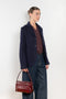 The Boiled Pinstripe Blazer by 6397 is a fitted buttoned jacket in a boiled wool with a delicate pinstripe pattern