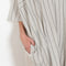 The Kaftan Dress by 6397 has an oversized silhouette and a short, wide sleeve, made from a Japanese patchwork cotton