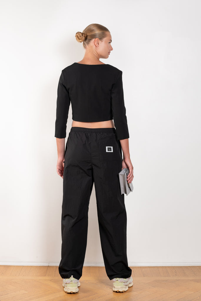 The Hooked Top 852 by Acne Studios is a cropped top with front hook and eye closure, a square-cut neckline and a zipper closure