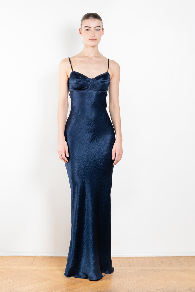 The Bijou Maxi Dress by Anna October is a signature evening maxi dress with an open back and lingerie details