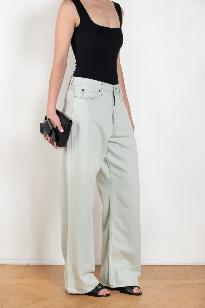 The 1981F Jeans by Acne Studios are cut to a loose fit with a low waist, wide leg and long length