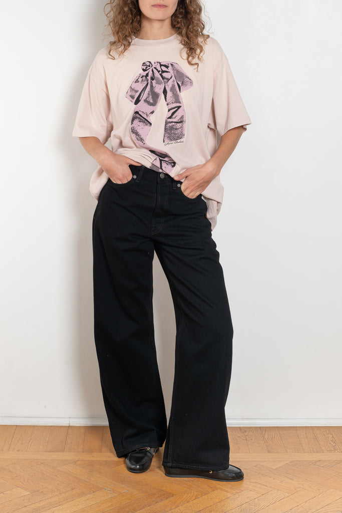 The 1981F Jeans by Acne Studios are cut to a loose fit with a low waist, wide leg and long length. Crafted from non-stretch denim in black