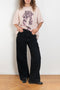 The 1981F Jeans by Acne Studios are cut to a loose fit with a low waist, wide leg and long length. Crafted from non-stretch denim in black