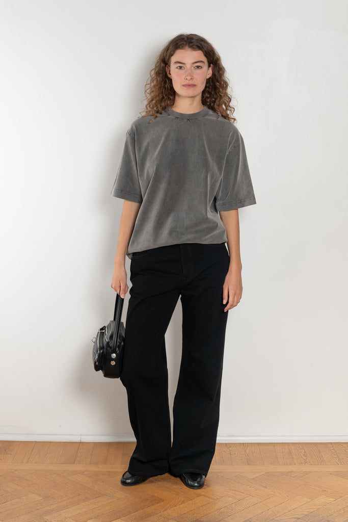 The 2021 Loose Fit Jeans by Acne Studios are cut to a loose fit with mid-waist, wide leg and long length. Made from rigid denim in a black black wash.