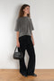 The 2021 Loose Fit Jeans by Acne Studios are cut to a loose fit with mid-waist, wide leg and long length. Made from rigid denim in a black black wash.