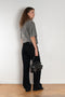 The 2021 Loose Fit Jeans by Acne Studios are cut to a loose fit with mid-waist, wide leg and long length. Made from rigid denim in a black black wash.