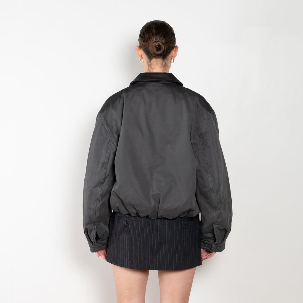 Bomber blouson jacket is crafted from twill cotton with a garment-dyed finish, an Acne Studios Stockholm 1996 logo patch at the front