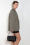 The Check Suit Jacketby Acne Studios is a single-breasted suit jacket with a check bicolour pattern
