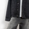 The Denim jacket by Acne Studios is crafted from non stretch denim in a black wash. Cut to a relaxed unisex fit with dropped shoulders and hip length