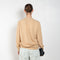 The Vneck Cardigan 029 by Acne Studios is a signature cardigan with a Face Logo patch on the chest