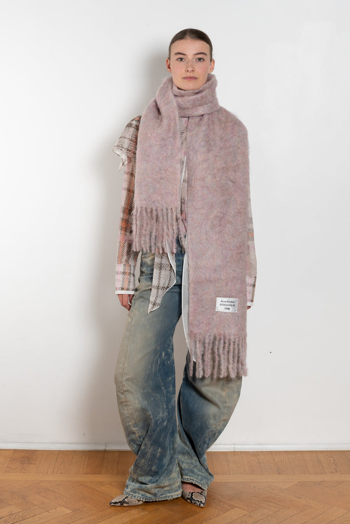 The Fringed Scarf Logo Label by Acne Studios is crafted from a wool alpaca blend detailed with an embroidered logo label.