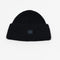 The Small Face Logo Beanie by Acne Studios features a small embroidered face logo patch and ribbed detailing, crafted from chunky wool.