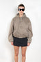 The Hooded Bomber Jacketby Acne Studios is crafted from twill cotton with a garment-dyed finish,&nbsp; centre front zipper closure, side pockets and elasticated waistband