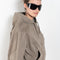 The Hooded Bomber Jacketby Acne Studios is crafted from twill cotton with a garment-dyed finish,&nbsp; centre front zipper closure, side pockets and elasticated waistband