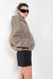 The Hooded Bomber Jacketby Acne Studios is crafted from twill cotton with a garment-dyed finish,&nbsp; centre front zipper closure, side pockets and elasticated waistband