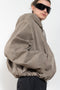 The Hooded Bomber Jacketby Acne Studios is crafted from twill cotton with a garment-dyed finish,&nbsp; centre front zipper closure, side pockets and elasticated waistband