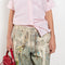 The Keychain Print Loose Jeans by Acne Studios are loose jeans with a mid waist and full length
