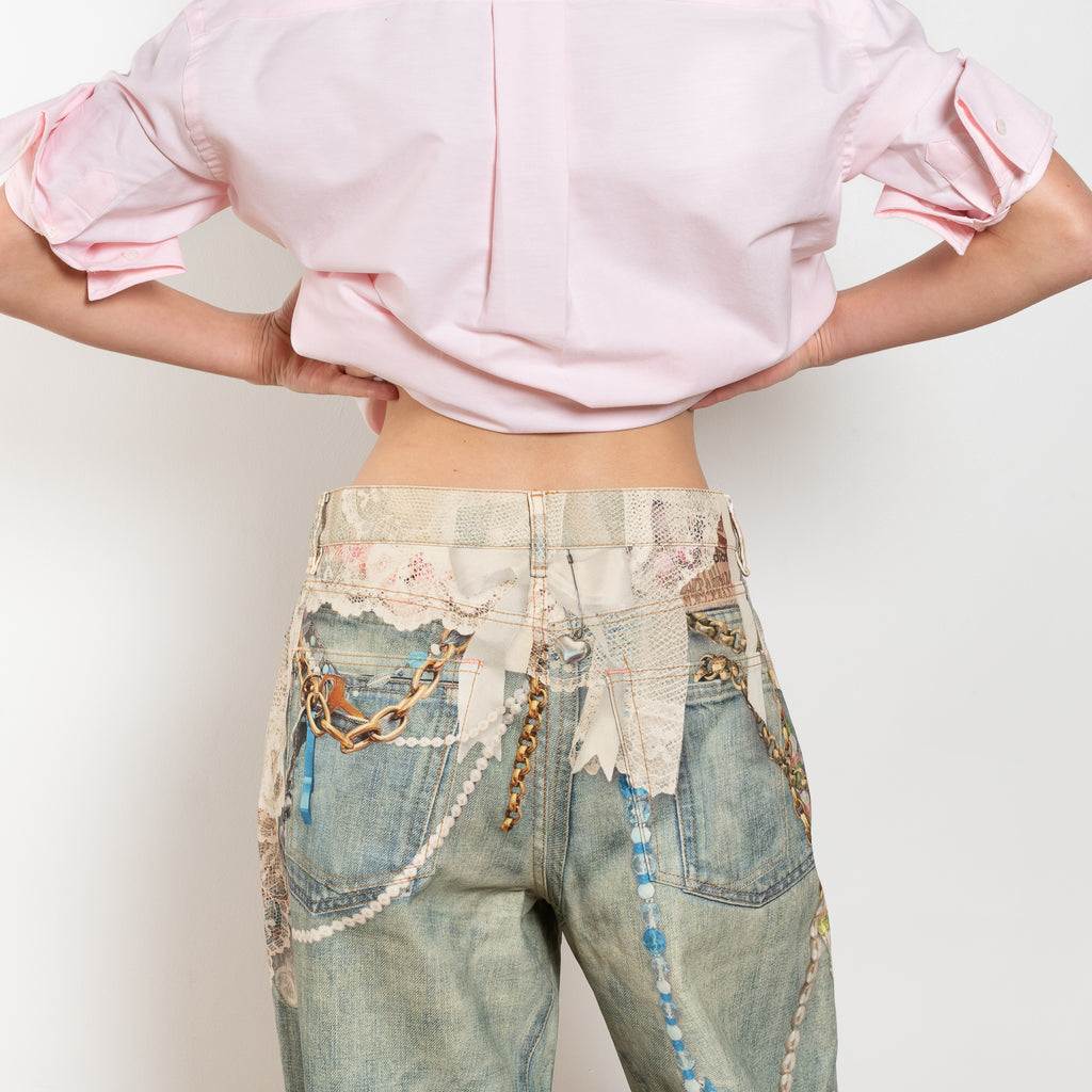 The Keychain Print Loose Jeans by Acne Studios are loose jeans with a mid waist and full length