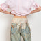The Keychain Print Loose Jeans by Acne Studios are loose jeans with a mid waist and full length