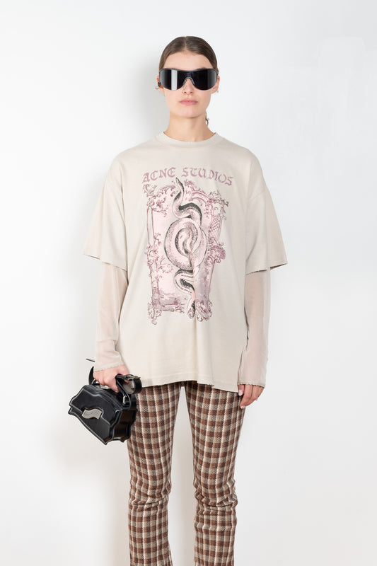 The Layered Tshirt by Acne Studios is a oversized Tee with a seasonal print and layered long sleeves in mesh
