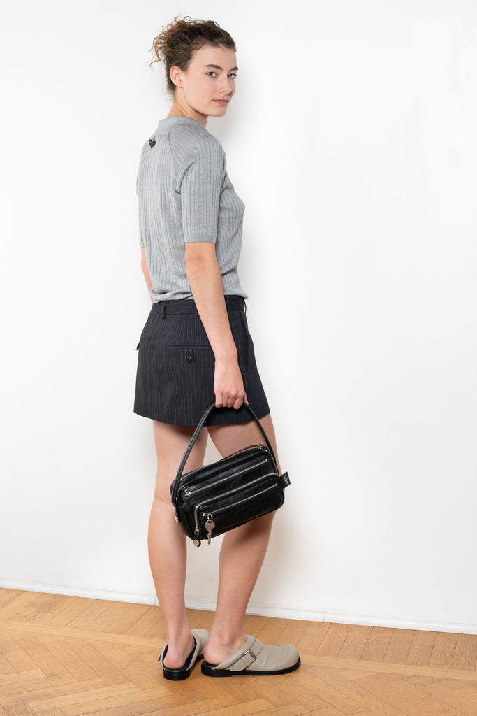 The Leather Buckle Shoes by Acne Studios are mule shoes crafted from soft nappa leather and detailed with branded buckles