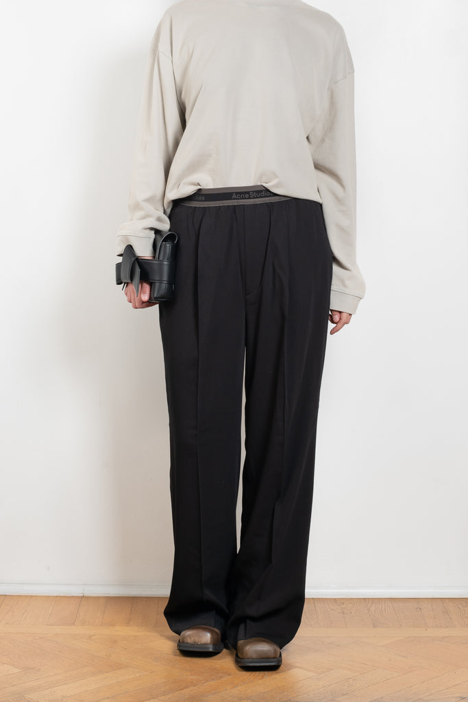 The Logo Tape Trouser 1265 by Acne Studios are crafted from a twill wool blend