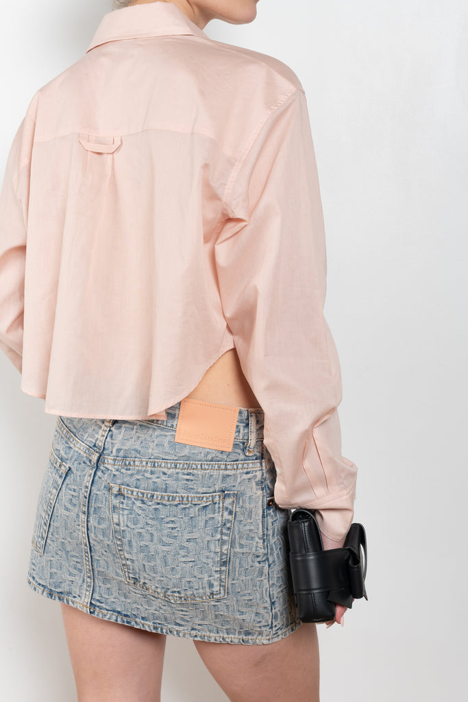 The Logo Crop Shirt 1077 by Acne Studios is a cropped shirt with a logo embroidery