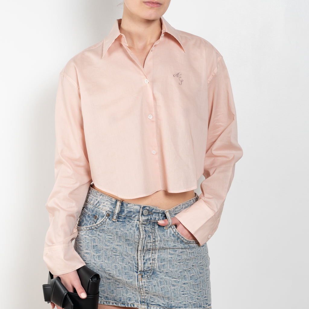 The Logo Crop Shirt 1077 by Acne Studios is a cropped shirt with a logo embroidery