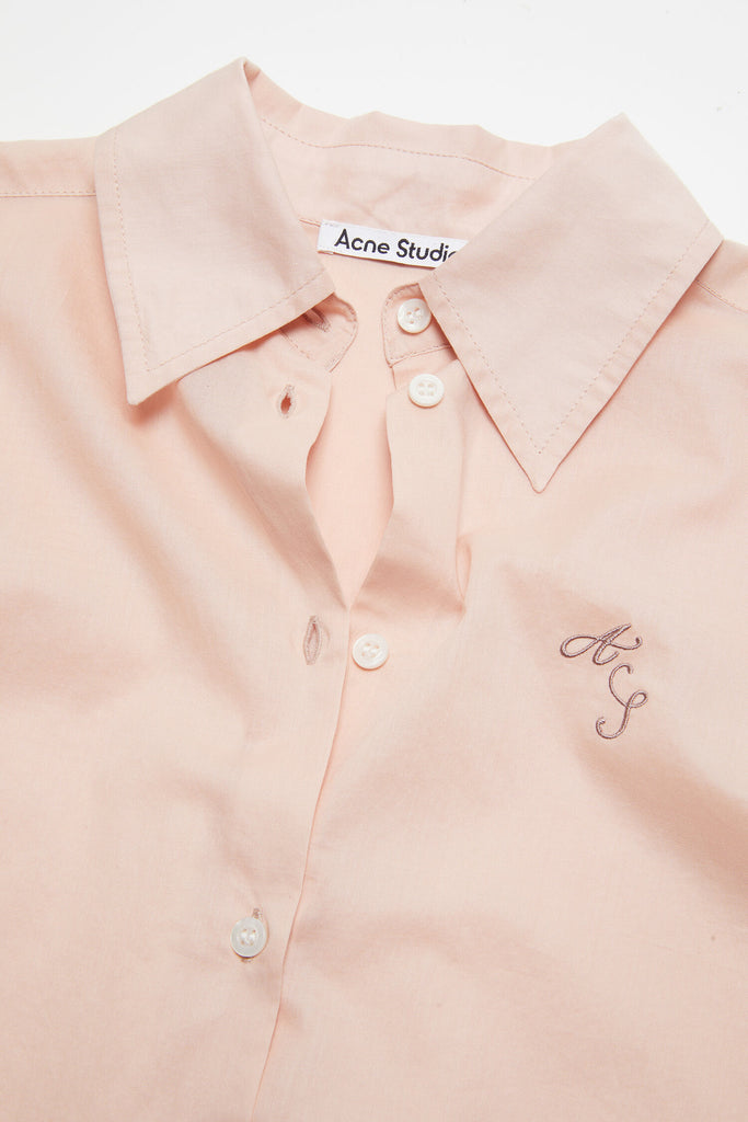 The Logo Crop Shirt 1077 by Acne Studios is a cropped shirt with a logo embroidery