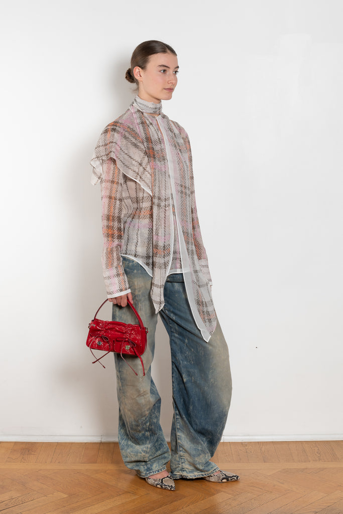 The Loose Fit Jeans 2006F by Acne Studios are cut to a loose fit with a low waist and wide, long legs with a twisted seam