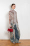 The Loose Fit Jeans 2006F by Acne Studios are cut to a loose fit with a low waist and wide, long legs with a twisted seam