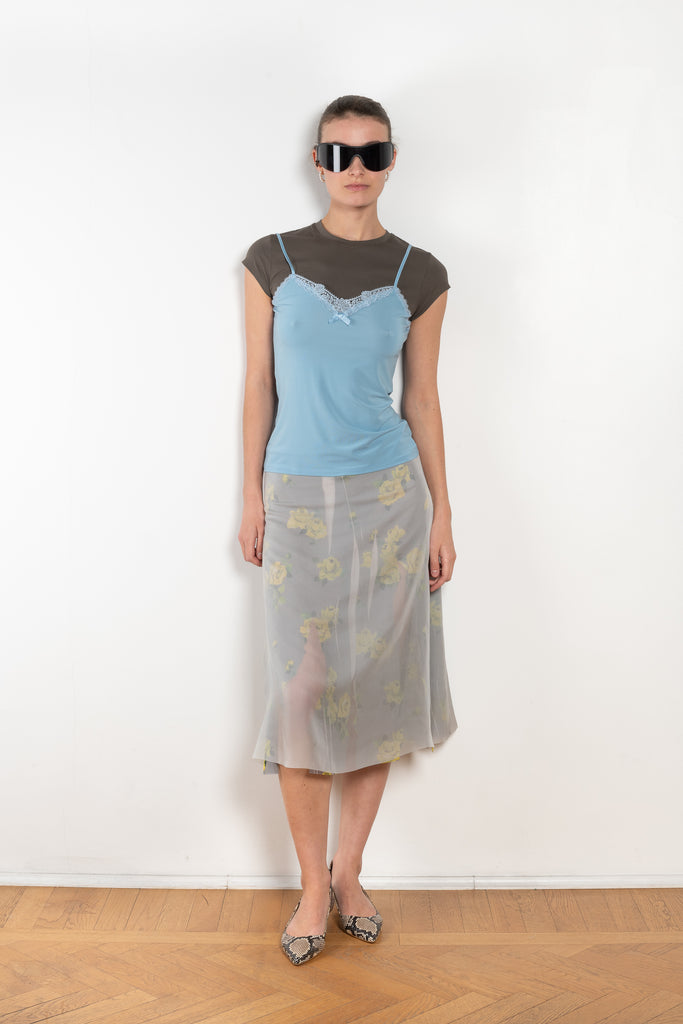 The Mesh Layered Skirt by Acne Studios features seasonal floral artwork, adorned with shredded cuts and double-layered mesh construction