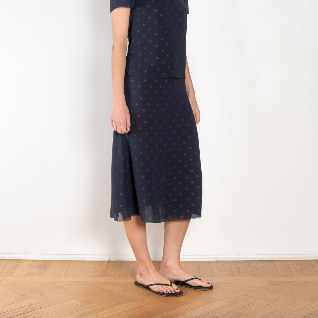 The Mesh Layered Skirt by Acne Studios features seasonal polka dot artwork, adorned with shredded cuts and double-layered mesh construction