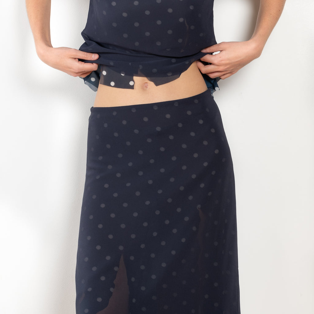 The Mesh Layered Skirt by Acne Studios features seasonal polka dot artwork, adorned with shredded cuts and double-layered mesh construction