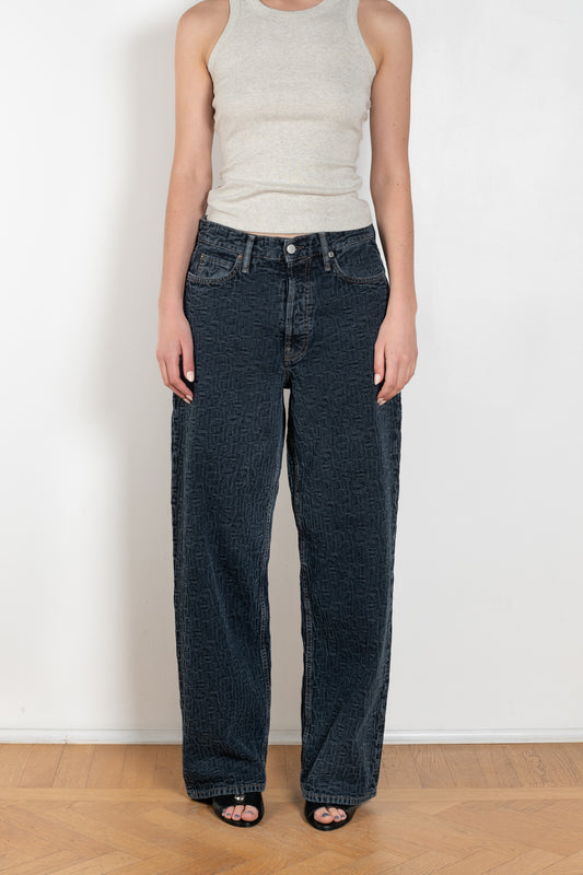 The 1981F Jeans by Acne Studios are cut to a loose fit with a low waist, wide leg