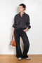 The Shirt Jacquard Pinstripe by Acne Studios is a button-up shirt in poplin cotton with a contrast bow embroidery