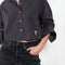 The Shirt Jacquard Pinstripe by Acne Studios is a button-up shirt in poplin cotton with a contrast bow embroidery