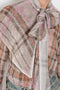 The Printed Silk Blouse by Acne Studios is crafted from lightweight silk with a trompe-l'oeil check print