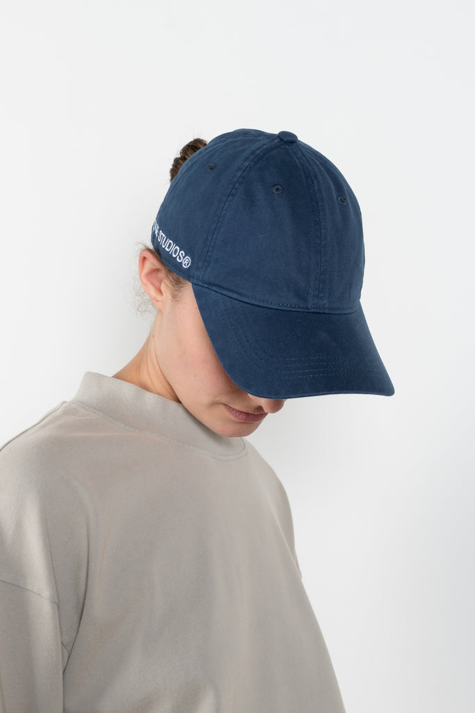 The Cotton Ripstop Cap by Acne Studios is a six-panel baseball cap crafted from ripstop cotton