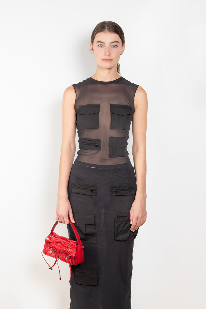 The Cargo Mesh Top by Acne Studios is a semi sheer top with front cargo pocket detailing