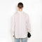 The Back and Front Buttoned Shirt by Acne Studios is cut to a relaxed fit and below hip length with back and front buttoning