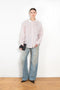 The Back and Front Buttoned Shirt by Acne Studios is cut to a relaxed fit and below hip length with back and front buttoning